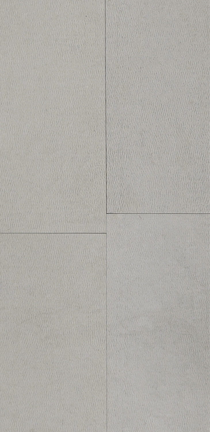 Four tiles in color Etheria Grey with a chiseled textured finish.