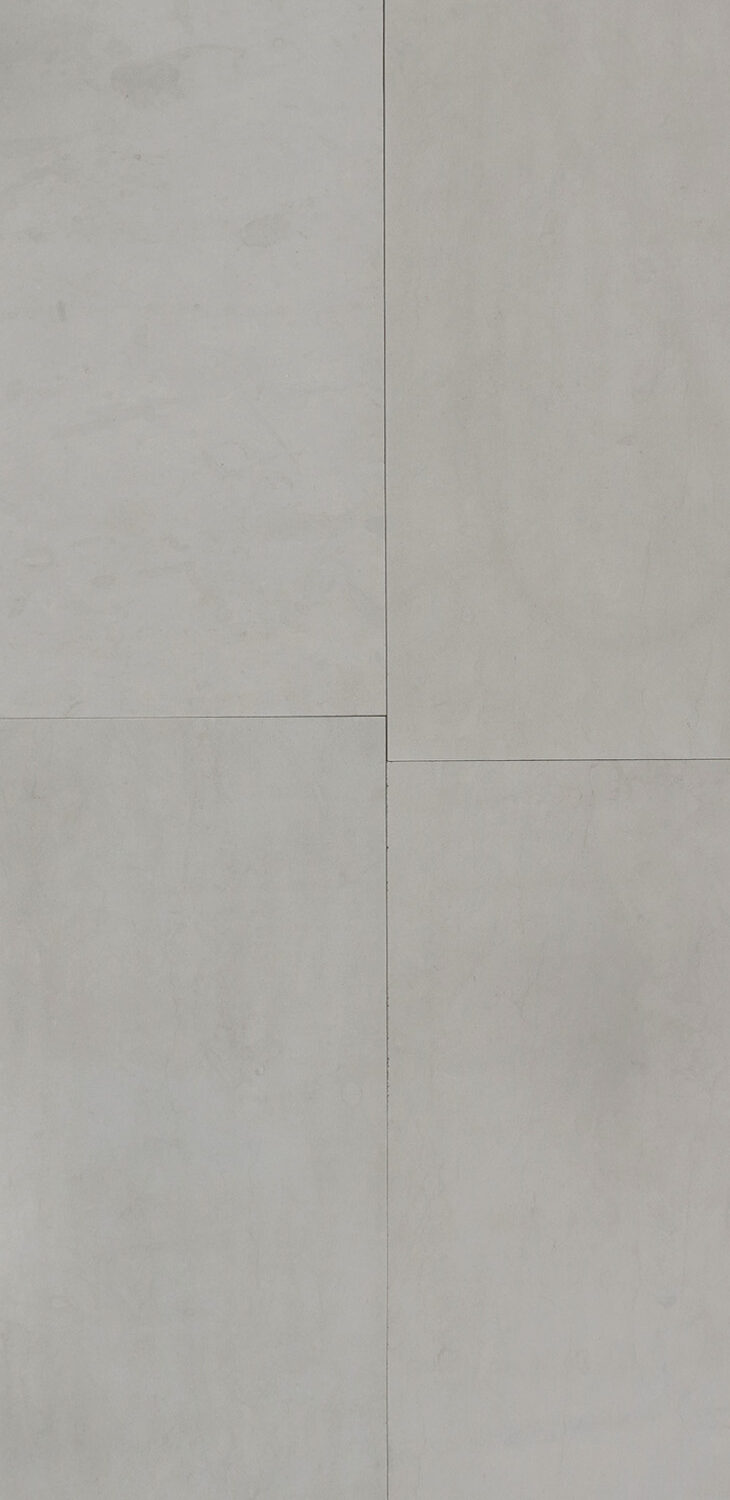 Four tiles in color Etheria Grey with a sandblasted finish.